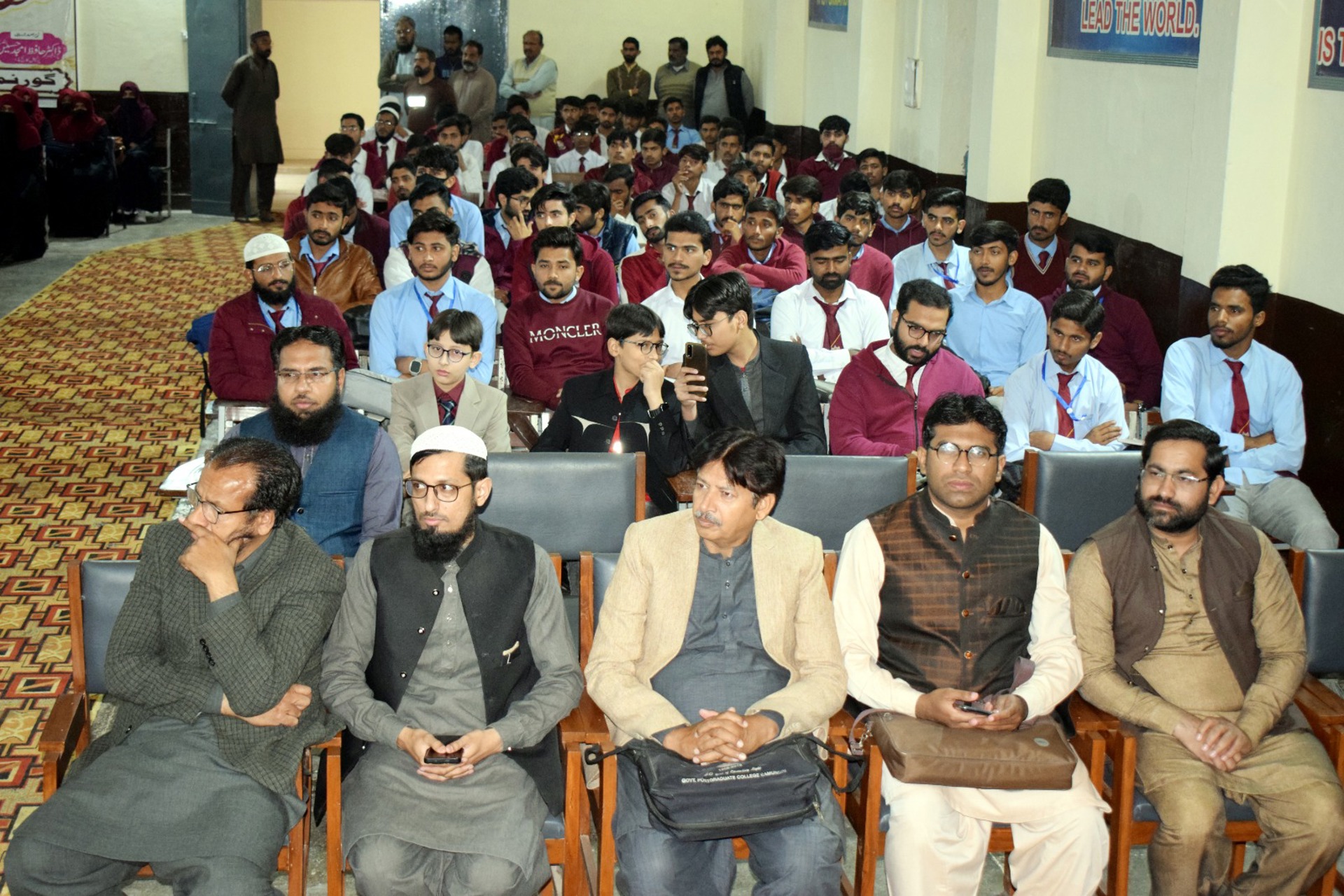 Professors and students attending Qirat competition